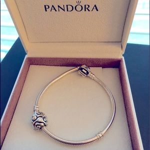 Pandora bracelet and charm with crystal stones.